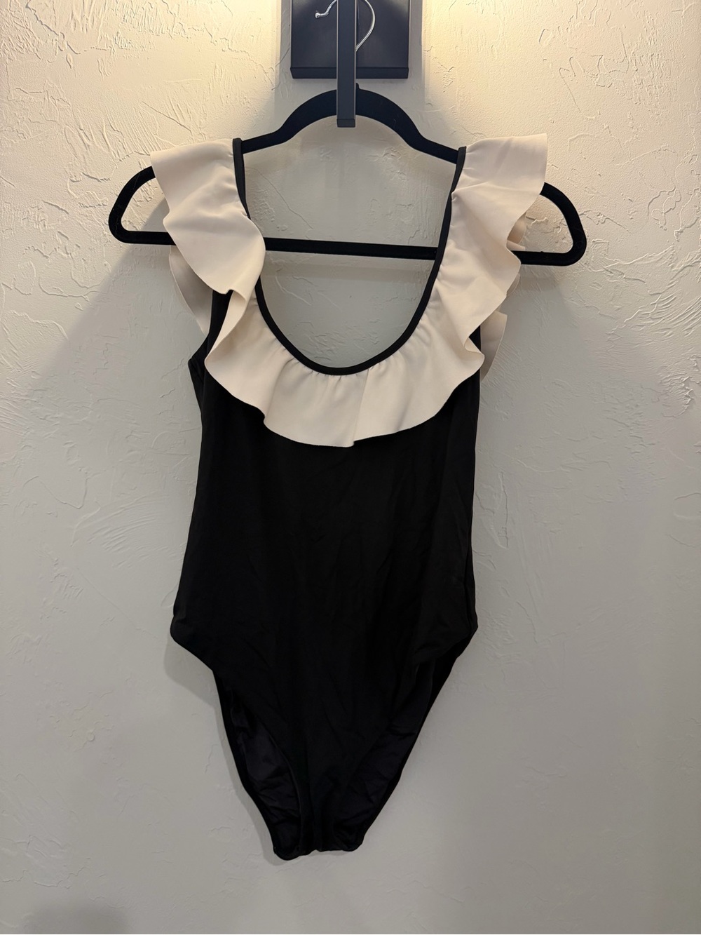 Black One-Piece Swimsuit with Cream Ruffle